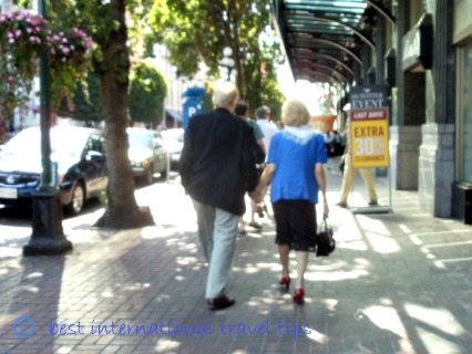 two people walking hand in hand -travel buddy